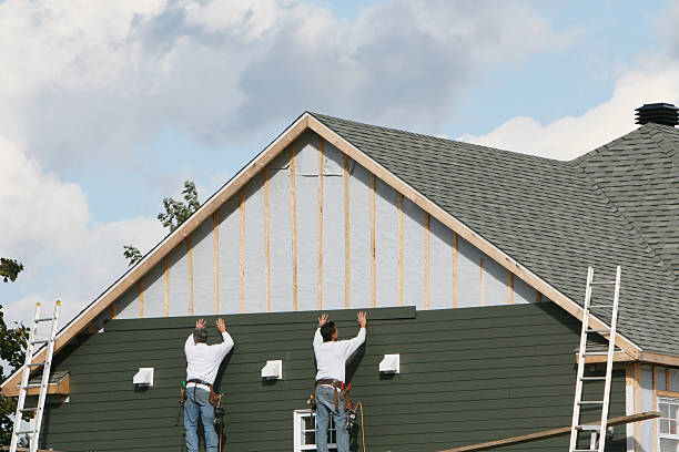 Professional Siding Installation technician working in Olney, TX